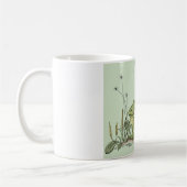 Die Tasse mit lustigem Bild des grünen Frosches (Links)