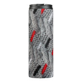 die Textur des Strickstoffes mit gestreiftem p Thermosbecher (Rückseite)
