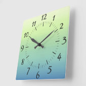 Die Uhr des Wandsteckplatzes mit tropischen Schatt (Winkel)