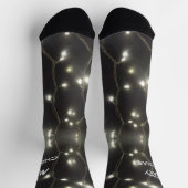 Die Weihnachtskruste brennt in Silberleuchten. Cre Socken (Oben)