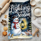 Die Weihnachtszeit des Schneemans beleuchten Geschirrtuch