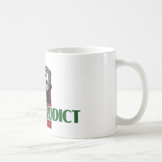 Die weiße Tasse des Mist-Süchtigen