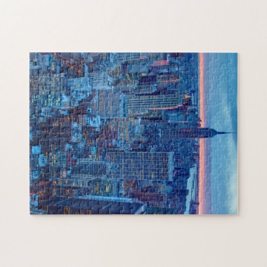 Die Wolkenkratzer von Manhattan werden beleuchtet Puzzle (Horizontal)