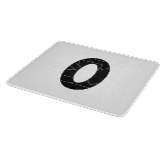 Die Zahl Null (0) in schwarz Schneidebrett (Ecke)