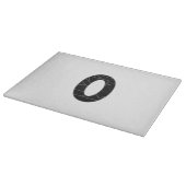 Die Zahl Null (0) in schwarz Schneidebrett (Ecke)