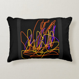 Dieses moderne Kissen hat ein buntes Neondesign