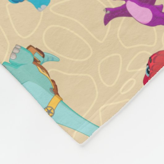 Dino Ranch | Ein Dinosaurier-Abenteuermuster Fleecedecke (Ecke)