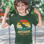 Dinosaur Birthday Boy Phantastisch seit dem Geburt T-Shirt<br><div class="desc">Gibt es Dinosaurier für die kleine Liebe? Dieses Shirt ist perfekt! Es gibt ein großes T-Rex Dino Sprichwort RAWR auf einem bedrückten Regenbogen Hintergrund. Alle Texte sind editierbar und stehen zur Zeit für Phantastisch Seit 2015 und den Namen des jungen Kindes. Ersetzen Sie mit dem Namen Ihres Kindes und dem...</div>
