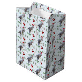 Dinosaur Christmas Wrapping Paper Roll Mittlere Geschenktüte (Rückseite Schrägansicht)