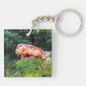 Dinosaur im Wald. Schlüsselanhänger (Rückseite)