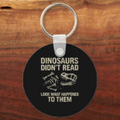 Dinosaurier haben keine Lektüre der lustigen Liter Schlüsselanhänger (Vorderseite)