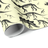 Dinosaurier-Skelett entbeint gelbes Geschenkpapier (Rolleneckpunkt)
