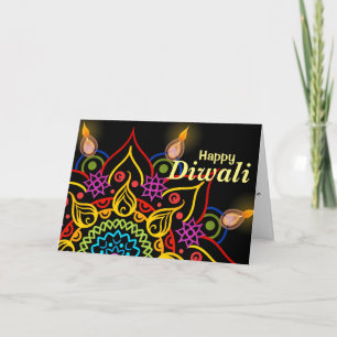 Diwali Blume Rangoli mit hellen Öllampen Karte