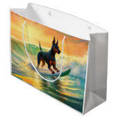 Doberman Beach Surfing Painting Große Geschenktüte (Rückseite Schrägansicht)