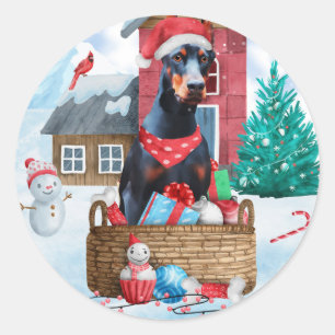 Doberman Hund im Schnee Weihnachtshundehaus Runder Aufkleber