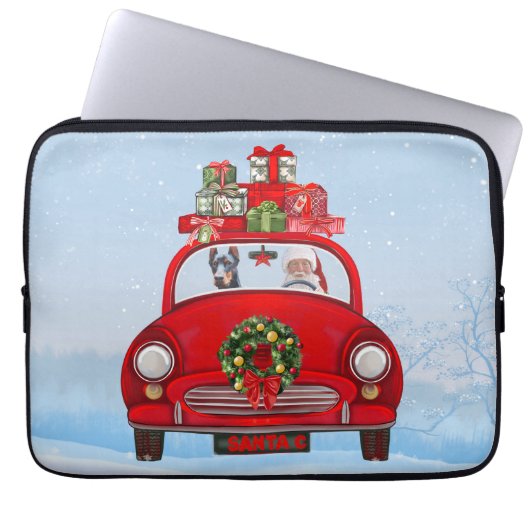 Doberman Hund in Auto mit dem Weihnachtsmann Laptopschutzhülle (Vorderseite)