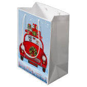 Doberman Hund in Auto mit dem Weihnachtsmann Mittlere Geschenktüte (Rückseite Schrägansicht)