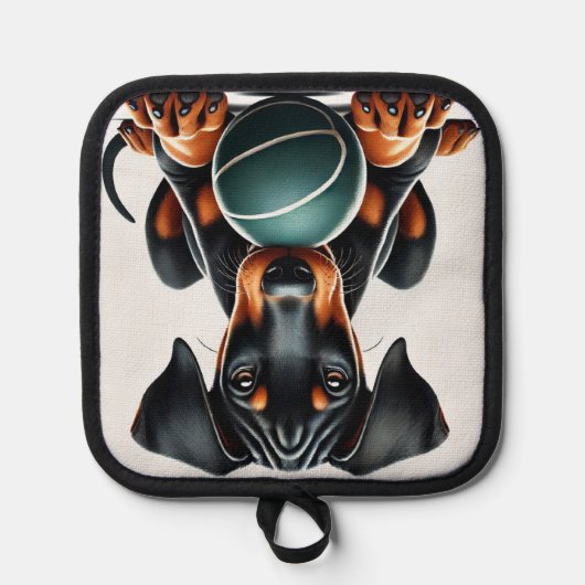 Doberman Pinscher Puppy hält einen Ball Topflappen (Vorderseite)