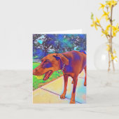 Doberman spielt leere Blankekarte Karte (Gelbe Blume)