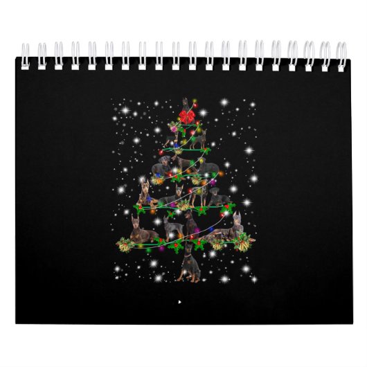 Doberman Weihnachtsbaum bedeckt durch Blitzlicht Kalender (Titelbild)