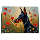 Dobermann auf einem Blumenfeld  Große Geschenktüte (Vorderseite)