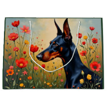 Dobermann auf einem Blumenfeld