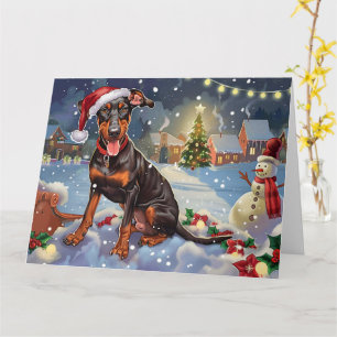 Dobermann-Hund im Schlitten Schnee Weihnachten Karte