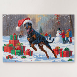 Dobermann läuft im Schnee mit Weihnachtsmütze Puzzle
