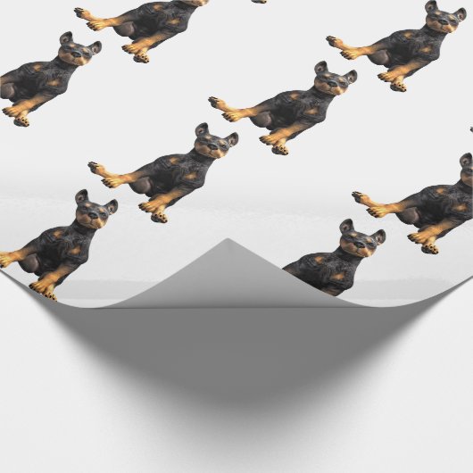 Dobermannpinscher-Welpen-Sitzen Geschenkpapier (Ecke)