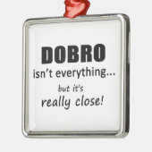 Dobro ist nicht alles silbernes ornament (Links)