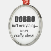 Dobro ist nicht alles silbernes ornament (Links)