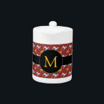 Dog Year 2018 Zodiac Birthday Monogram Teapot<br><div class="desc">Maßgeschneiderter Teekessel mit blauen und gelben Hundemustern auf dunkelrotem Hintergrund schwarzes Band und rundem Tag für Monogram vorne. Sie können das Monogramm einfach ändern und Text (Schriftart, Farbe, Größe und Position) hinzufügen, indem Sie auf die Schaltfläche Anpassen klicken. Passende Stoffserviette, Tischset und viele andere Produkte... Perfekt für Chinesisch Neujahr des...</div>
