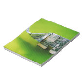 Dollar-Bill Origami Elephant auf grünem Hintergrun Notizblock (Rotiert)