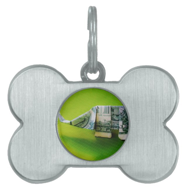 Dollar-Bill Origami Elephant auf grünem Hintergrun Tiermarke (Vorderseite)