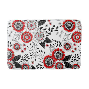 Doodle-Blume und -Blätter in Rot und Schwarz Badematte
