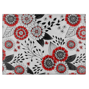 Doodle-Blume und -Blätter in Rot und Schwarz Schneidebrett