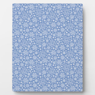Doodle Snowflakes auf blauem Hintergrund Fotoplatte