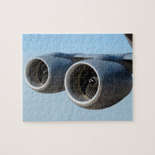 Doppelte Düsentriebwerke am blauen Himmel Puzzle