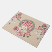 Doppeltes Glück-Symbol auf leichtem Fußmatte (Schrägansicht)