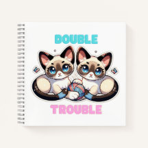 Doppeltrouble kitt auf Notebook