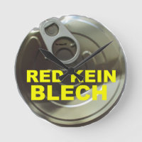 Dosendeckel-Uhr mit Text: "RED KEIN BLECH"