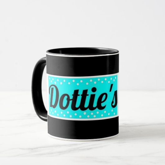 Dottie's Store-Logo-Kaffee-Tasse (schwarz/blau/wei Tasse (Vorderseite Links)