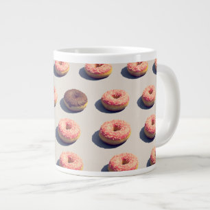 Doughnüsse in einer Gruppe Jumbo-Tasse