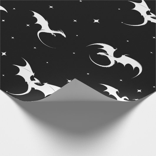 Drachen und Sterne auf schwarzem Hintergrund Geschenkpapier (Ecke)