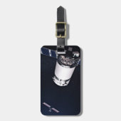 Dragon Xl Spacecraft nähert sich einem Lunar Gatew Gepäckanhänger (Vorderseite vertikal)