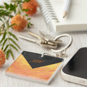 Dragons Augenorange und Schwarze Monogramm Schlüsselanhänger (Vorderseite rechts)