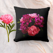 Dramatische rosa und violette Pfingstrosen