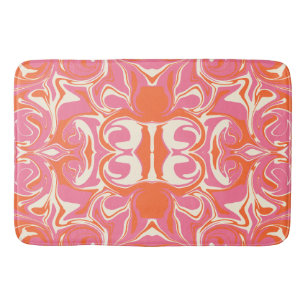 Drehmuster in Rosa, Orange und Creme Badematte
