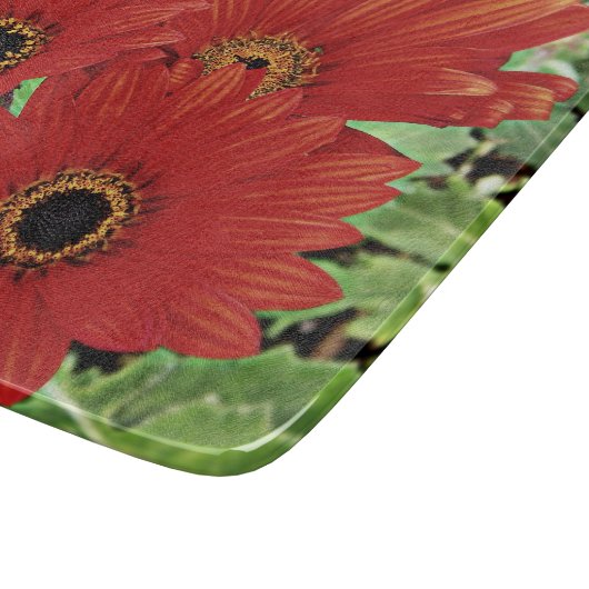 Drei blühen in rot schneidebrett (Ecke)