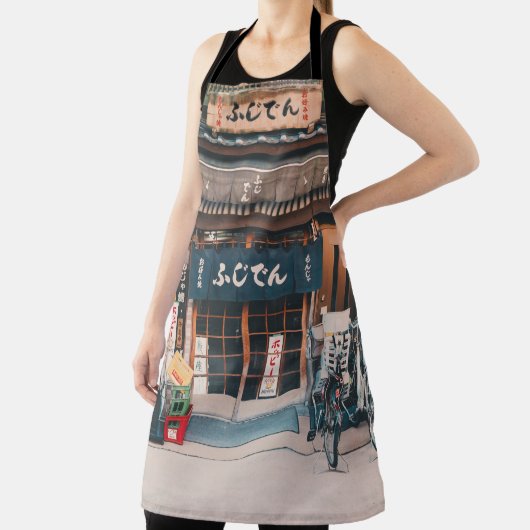 DREI FAHRRÄDER, DIE VOR GEBÄUDE PARKIERT WURDEN SCHÜRZE (InSitu)